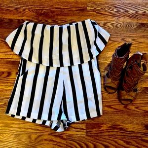 Summer is coming! Beautiful, never worn boutique romper. Black and white. Size L